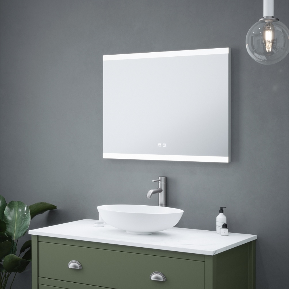 Product Lifestyle image of the Hernan Colour Changing LED Mirror mounted above a vanity unit with countertop basin